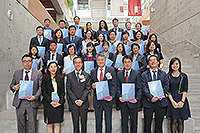 Group photo of all members of the training programme at the closing ceremony with Prof. Dennis Ng (third from left on the first row), Associate Vice-President of CUHK; and Mr. Wang Zhiwei (middle on the first row), Deputy Director of the Office of Hong Kong, Macao & Taiwan Affairs of the State Ministry of Education